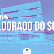 Imagem com o seguinte texto "Atenção Eldorado do Sul". Ao fundo, imagem da sede da Defensoria Pública do Município.