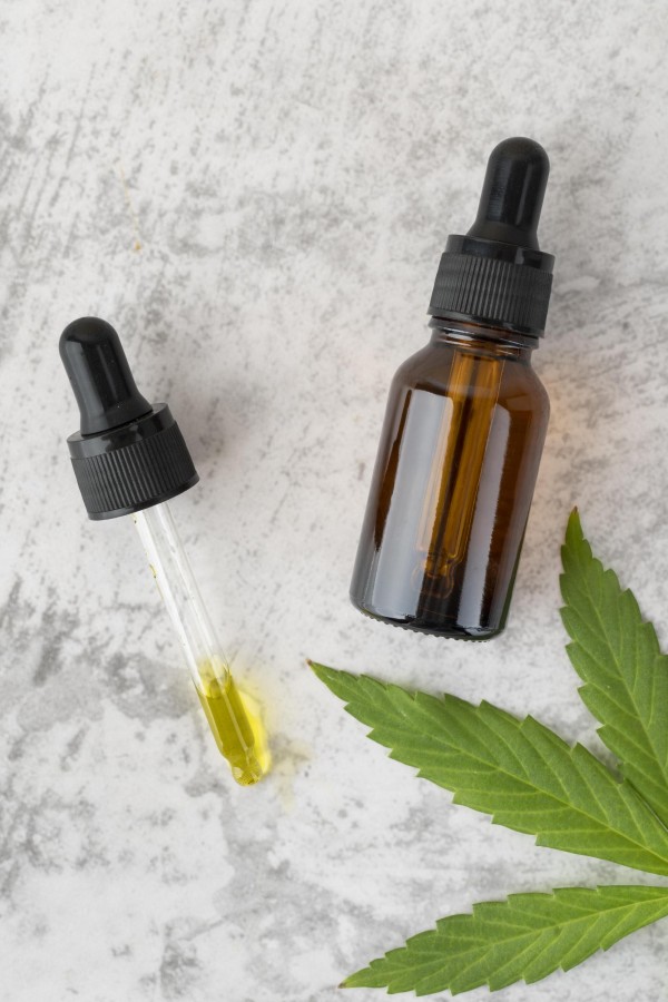 top view natural cannabis oil bottle assortment (1)