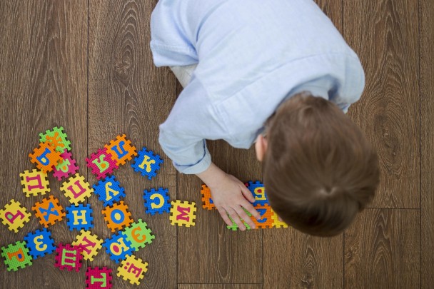 boy playing with alphabet game (1)